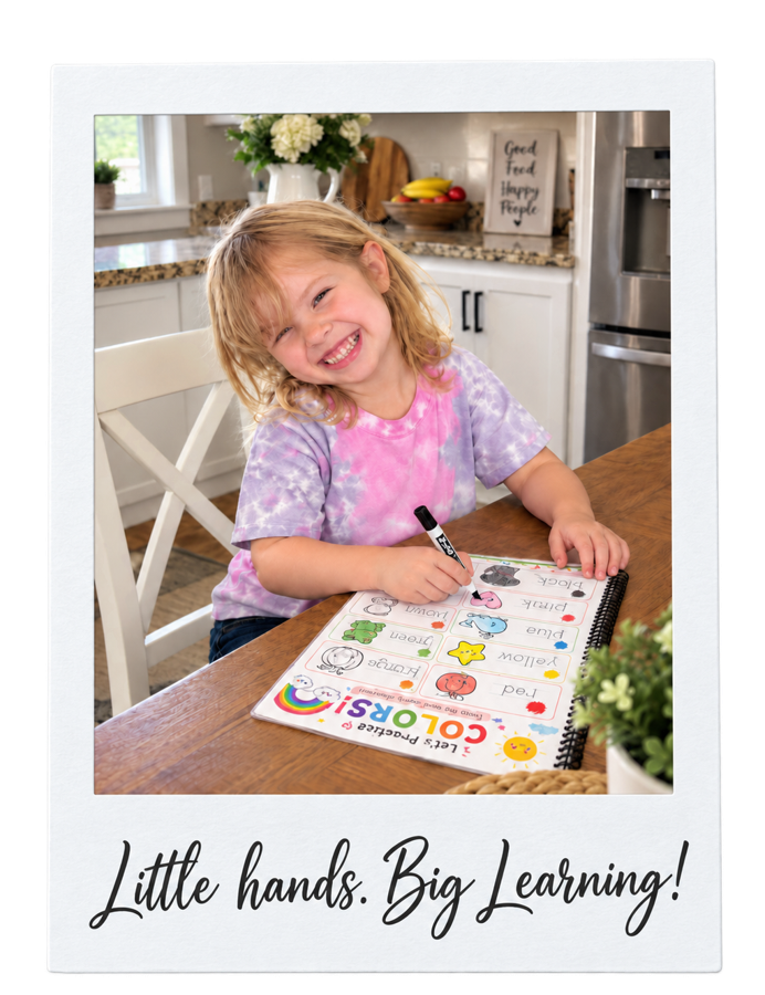 A little girl smiling while working on a colors practice page in the activity book. Caption reads: Little hands. Big learning!